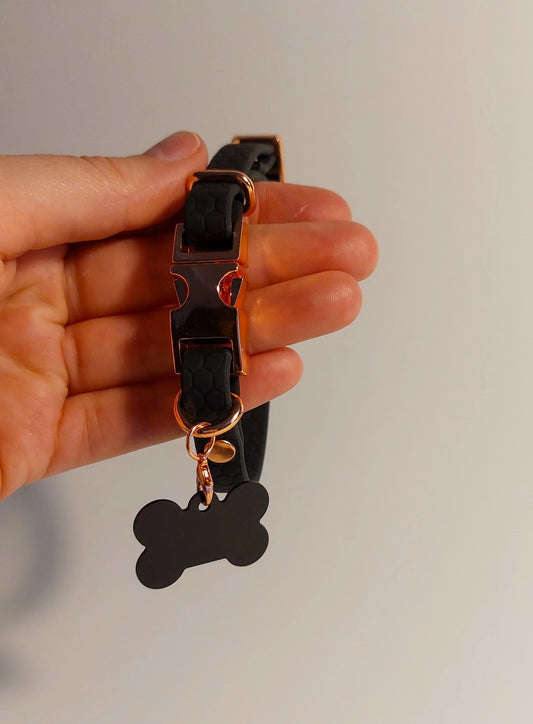 Dark grey cat collar with ID tag